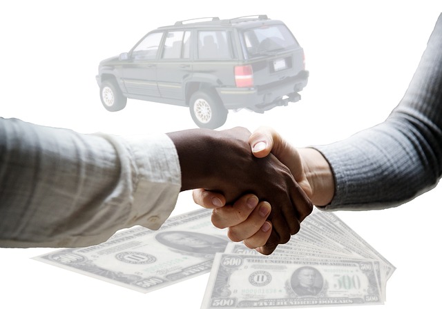 2 people shaking hands with a car and dollar bills in the background