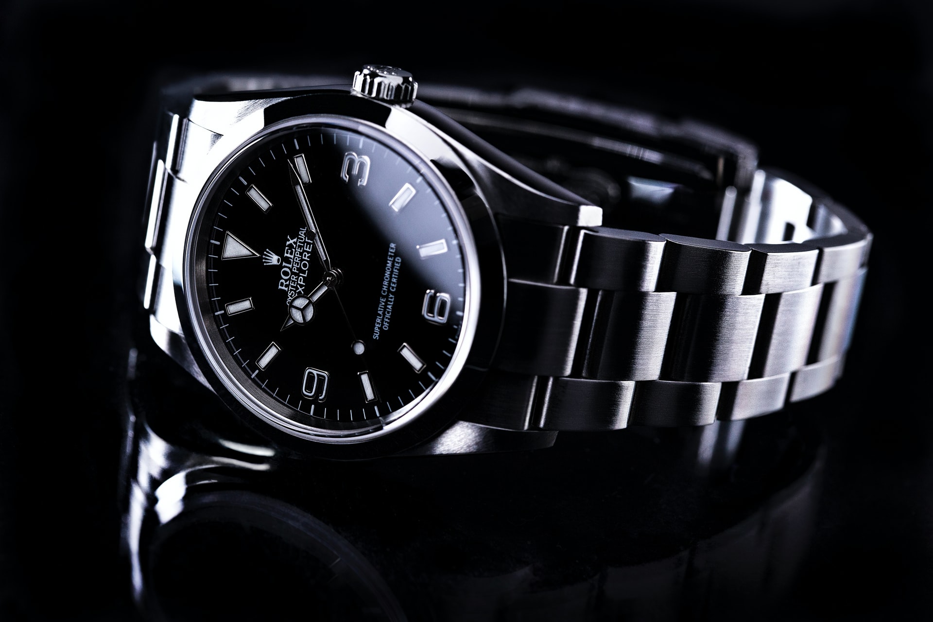 Siler Rolex watch on black background