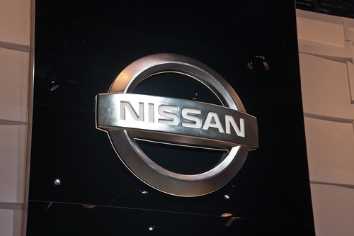 Nissan logo on wall of dealership