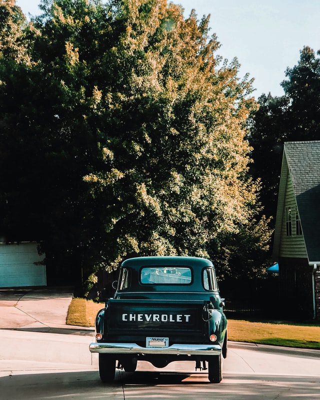 Older Style Chevrolet Car in a driveway